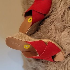 Beautiful red wedge shoes to be worn with nice summer dresses. Size 9.